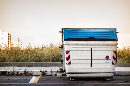 Professional rubbish removal team handling household waste